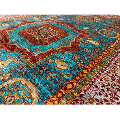 Hand-knotted rug, close-up: multicolored ornaments and fine weave structure