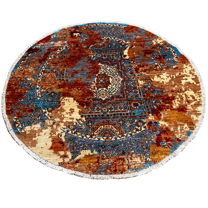 Round Mamluk rug with a border all around, pattern in rust brown, blue, and cream