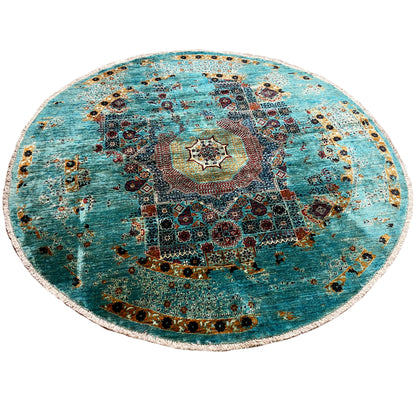 Round Mamluk rug, turquoise pile with a central star medallion and decorative border