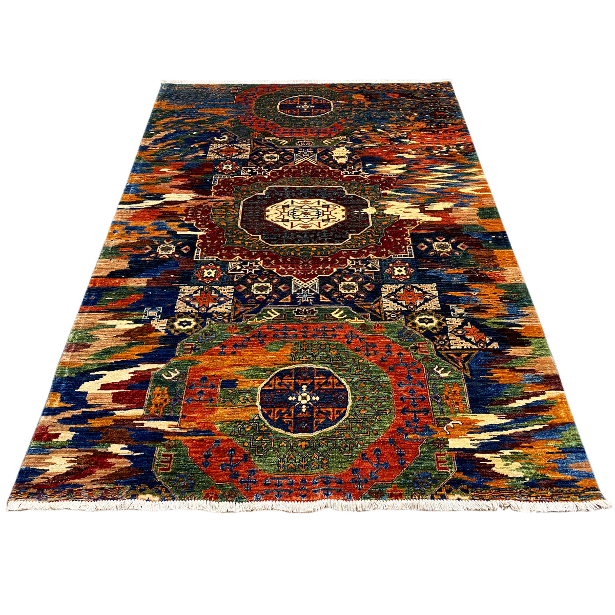 Mamluk rug with a colorful pattern, rectangular, with a surrounding fringe border.