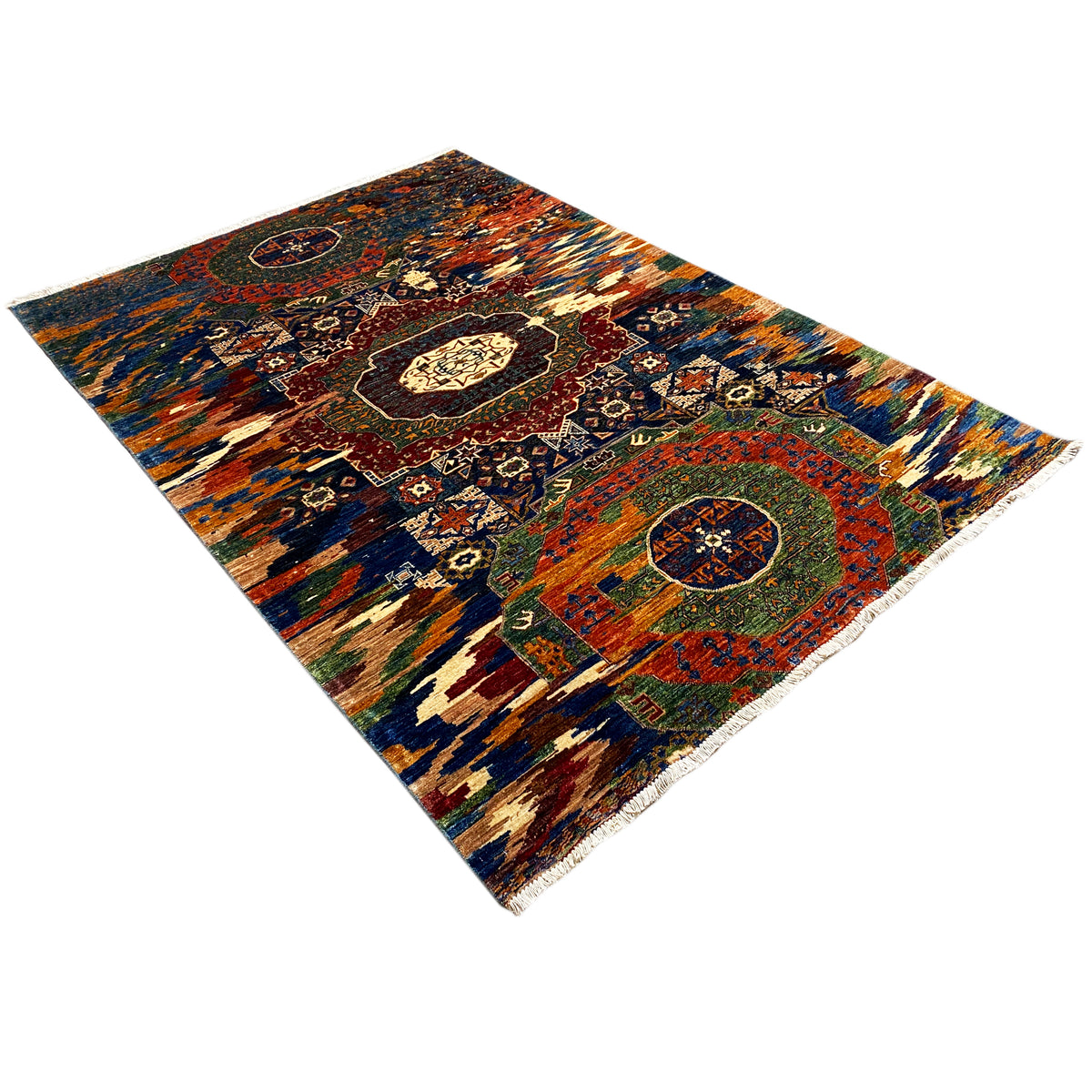 Mamluk carpet diagonally from the corner, colorful decorative pattern with a central medallion.