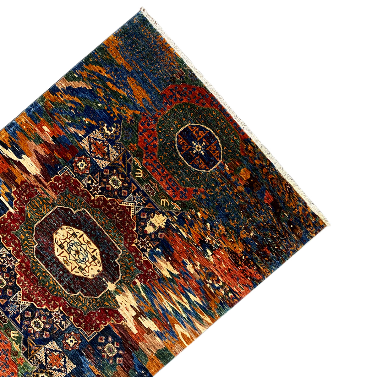 Mamluk rug with diagonal, bold ornamental fields and medallions, bordered all around.