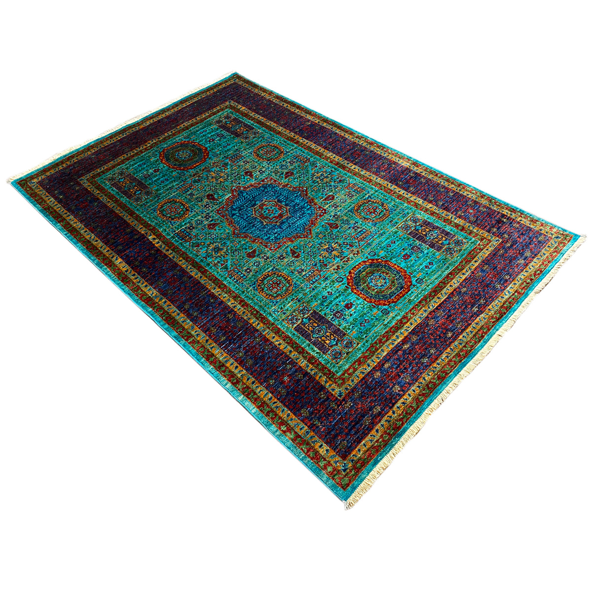 Mamluk rug in turquoise and dark blue with a central medallion and geometric motifs