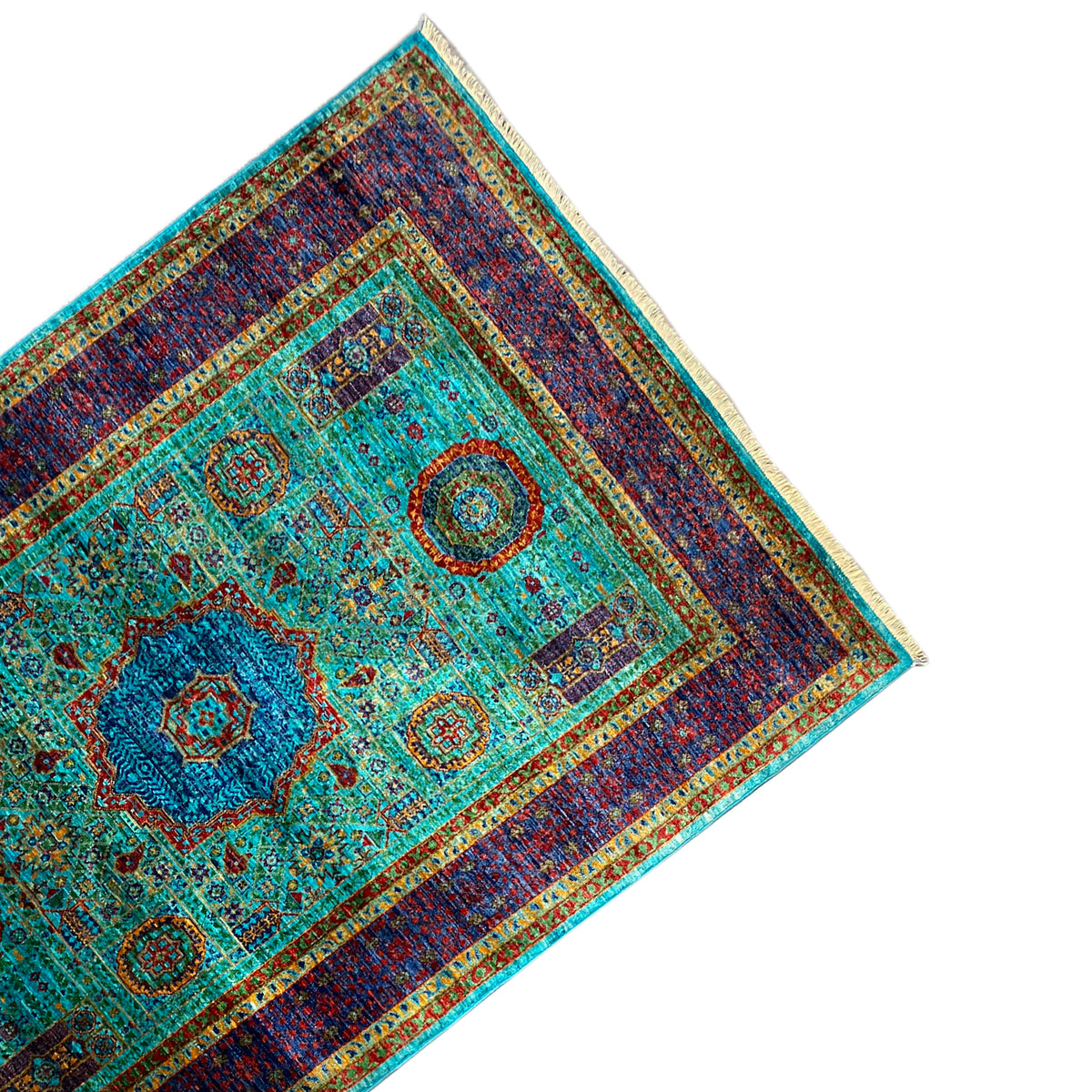 Mamluk carpet at an angle: turquoise field with a row of medallions and a dark blue border