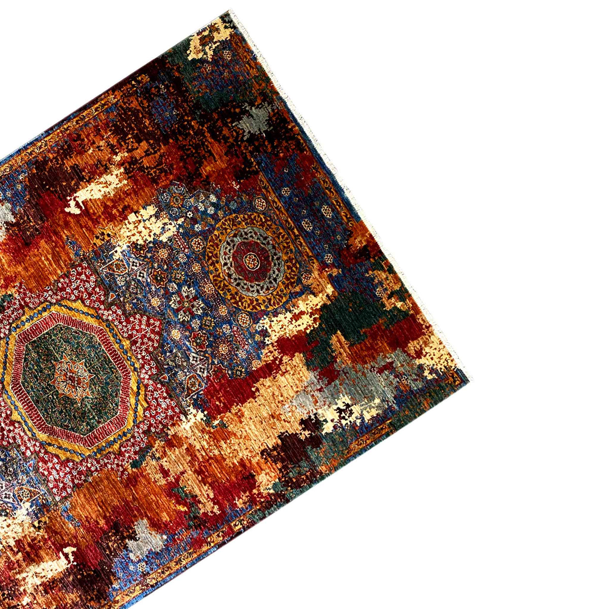 Mamluk carpet shown diagonally, medallions in blue and red with a white border
