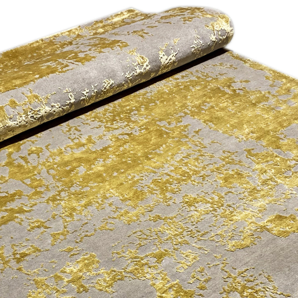 Modern rug (311x200 cm), rolled: gray base with gold-colored textured patches