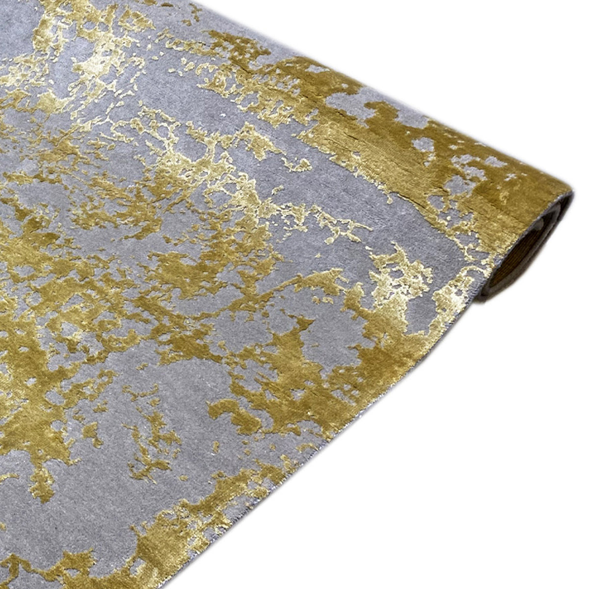 Modern rug (311x200 cm) laid out: gray base pattern with gold-colored speckled design