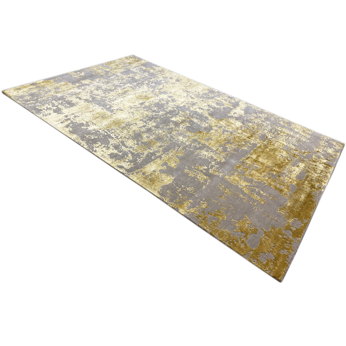 Modern rug 311x200 cm, positioned at an angle, with an abstract textured pattern in gray and gold.