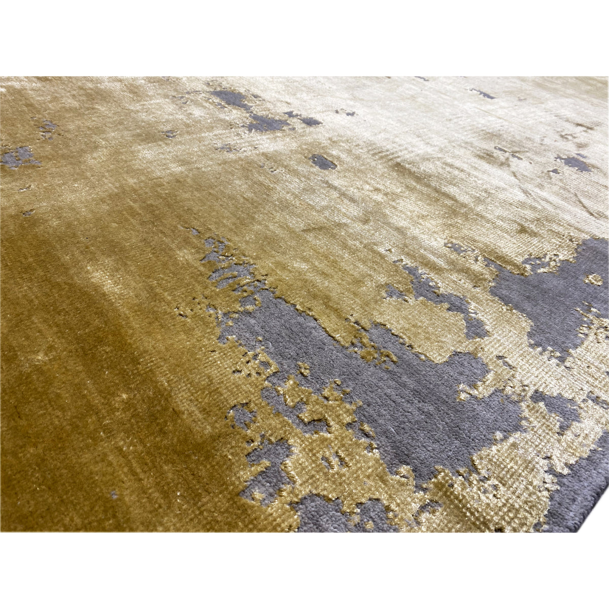Close-up: modern carpet with a yellow surface and blue-gray color sections