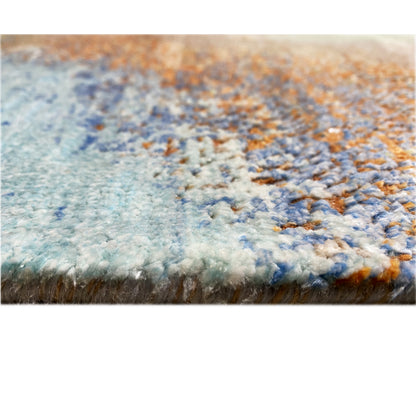 Modern rug 312x209 cm close-up of the texture with blue-gray and orange accents