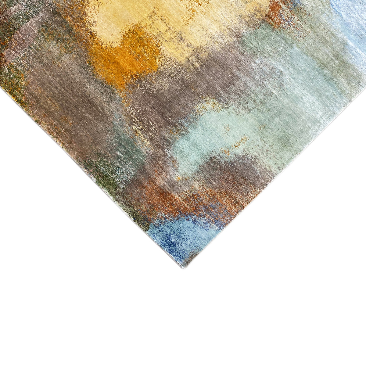 Modern rug 312x209 cm corner view with abstract color fields in green, blue, and brown