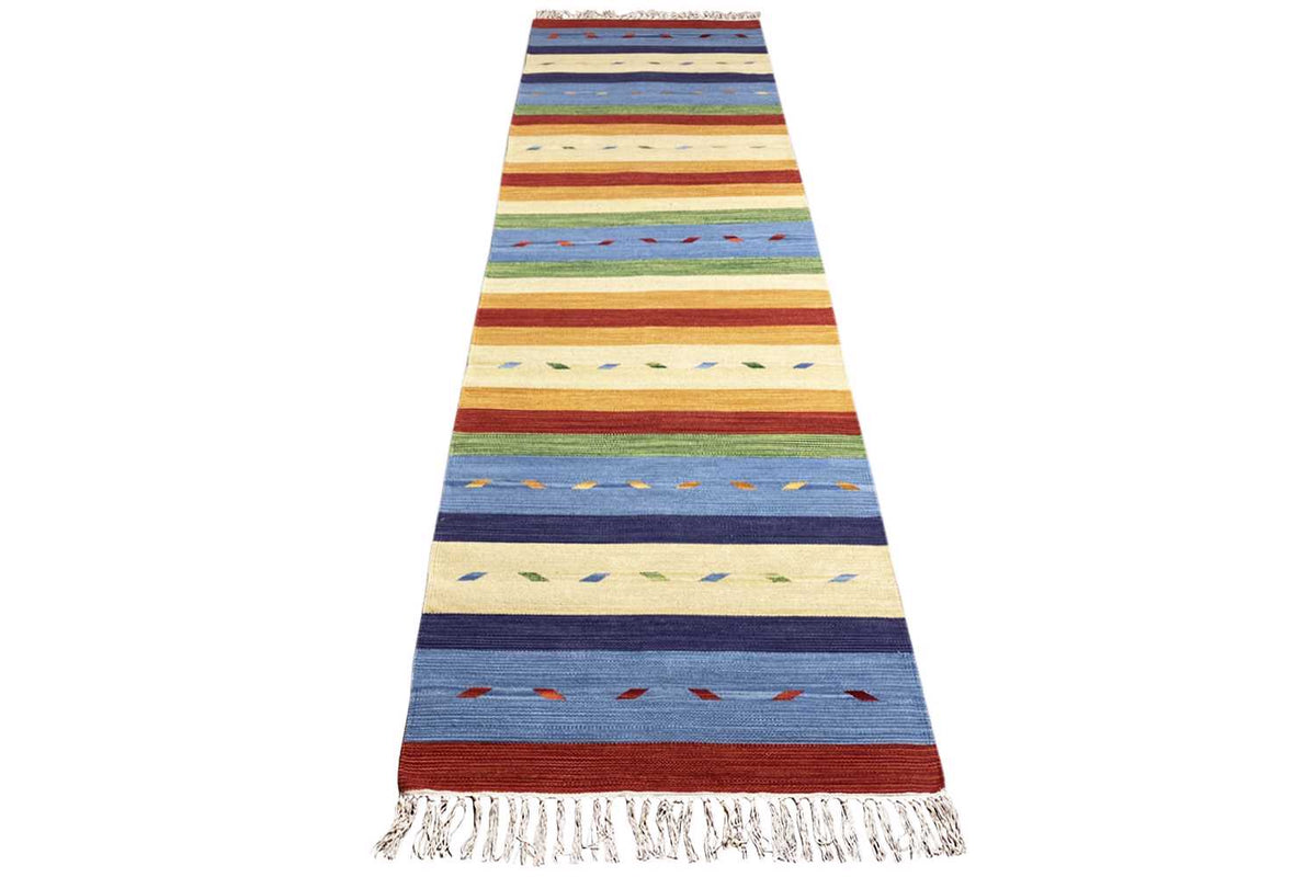 Kelim runner rug in a striped design with fringes at both ends