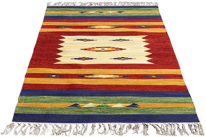 Kilim rug with a red-and-white zigzag pattern and colorful stripes, with fringes