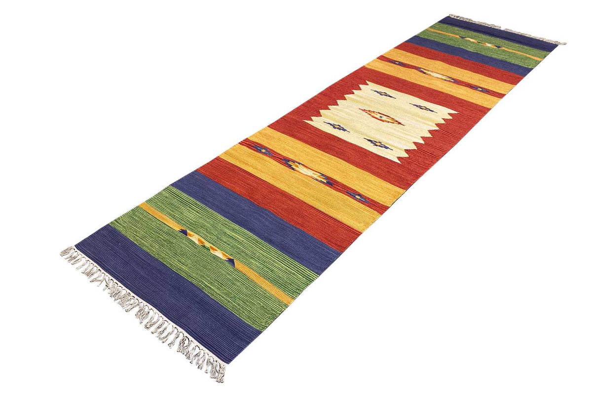 Kilim runner rug with multicolored striped patterns and fringes at the ends