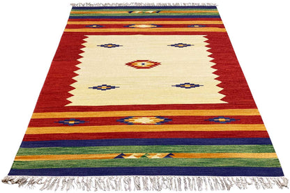 Kilim rug with stripes and diamonds in red, cream, blue, and green, fringes along the edge
