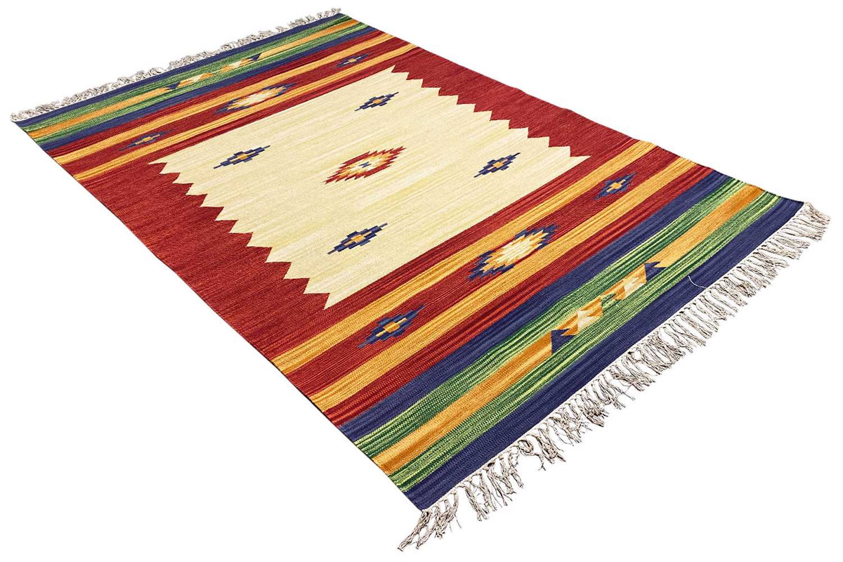 Diagonal kilim rug: red, blue and green stripes on a beige background with fringes