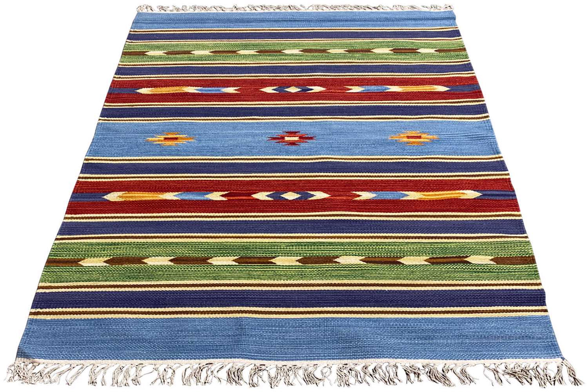 Kilim rug with stripes in blue, green, and red, with fringes along the edge