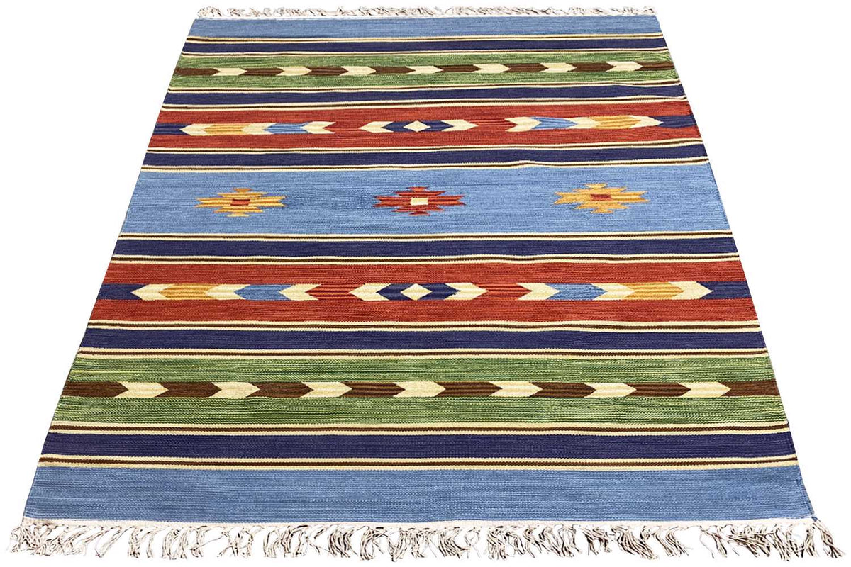 Modern blue kilim rug with stripes and cross/diamond motifs, with fringes