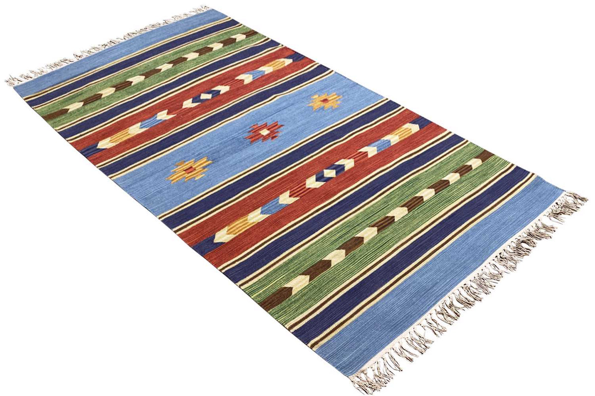 Kilim rug, diagonal: blue with colorful ornamental stripes and fringes along the edges