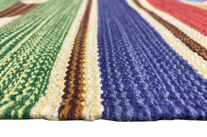 Kilim rug fabric in detail: blue with colorful lines, flat-woven structure