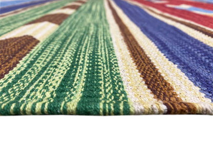 Kilim rug with green, blue, and beige stripes, woven pattern lines, and fringes