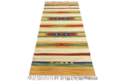 Kilim runner with wide stripes in cream, green, blue, and red, with fringes
