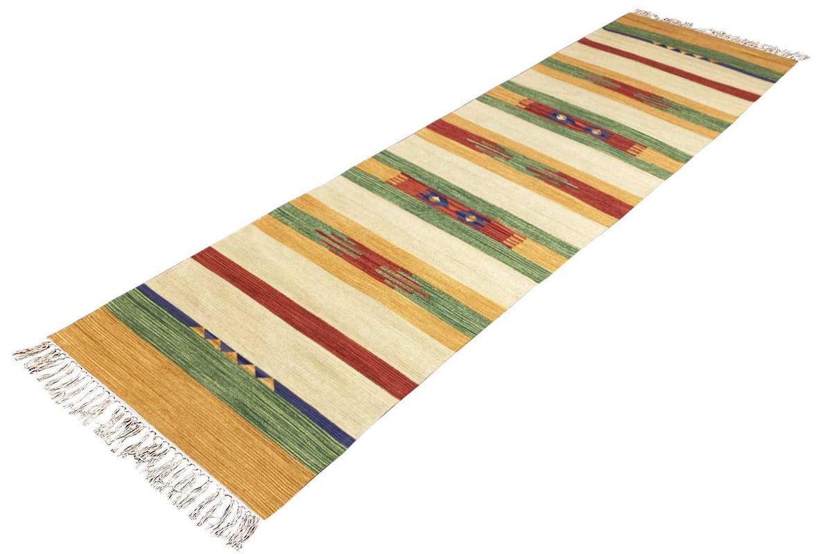 Kelim runner viewed diagonally, with colorful stripes and fringes along the edges