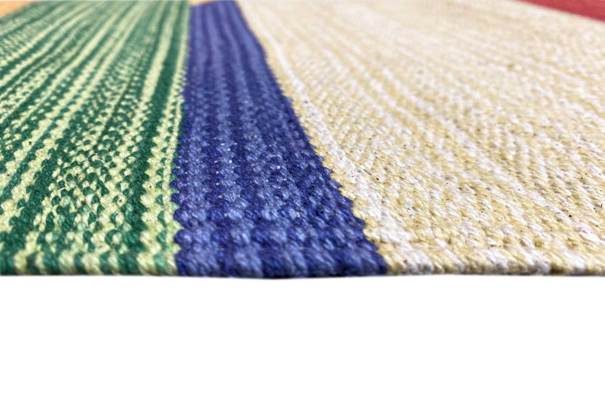 Close-up: Kilim runner texture with green and blue stripes, light pile fibers