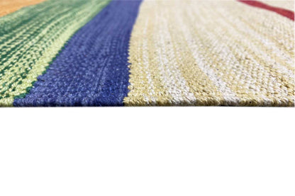 Kilim rug with diagonal stripes in green, blue and cream, side selvedge