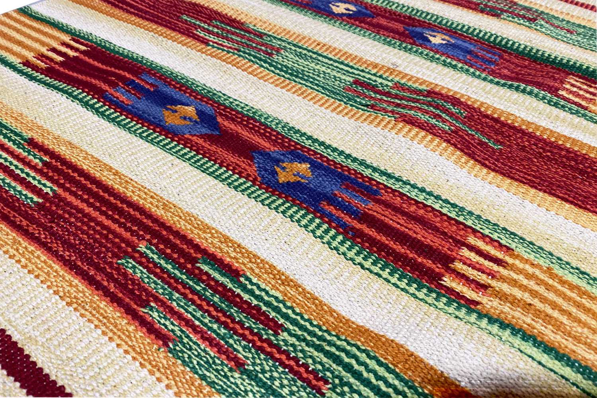 Close-up of a kilim rug: striped pattern with ornaments, multicolored