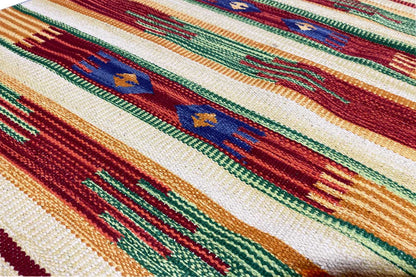 Close-up of a kilim rug: striped pattern with ornaments, multicolored