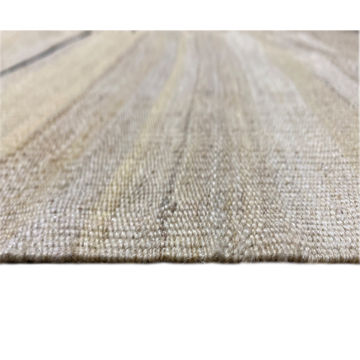 Carpet fabric in detail, creamy background with a fine texture and subtle lines