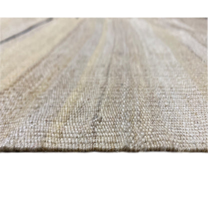 Carpet fabric in detail, creamy background with a fine texture and subtle lines