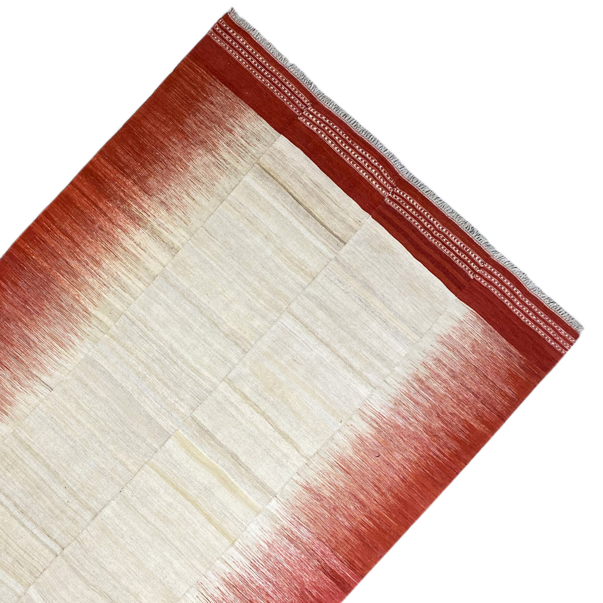 Kilim corner: cream-white field with stacked rectangles, reddish-brown border with dotted trim