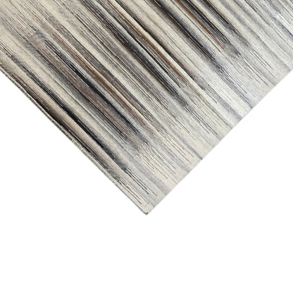 Corner of a kilim dhurrie with dense stripes in gray and beige