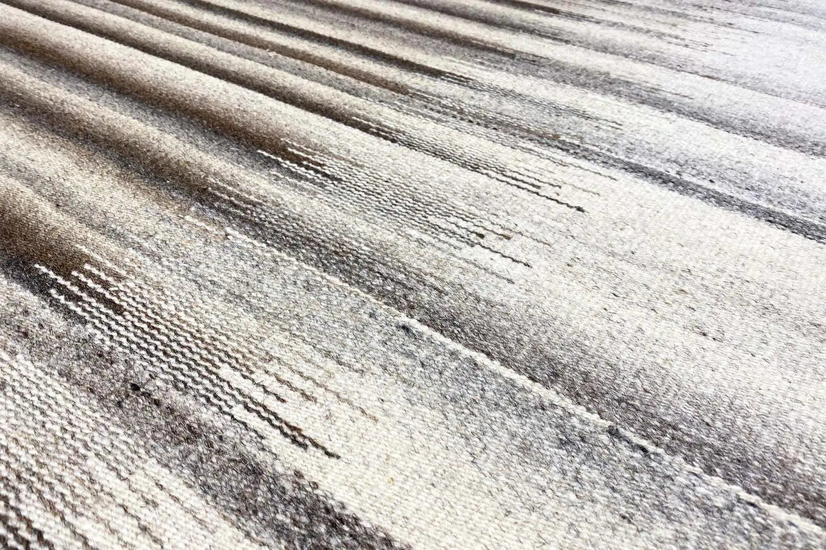 Surface detail with light and dark gray-beige stripes in a vintage look