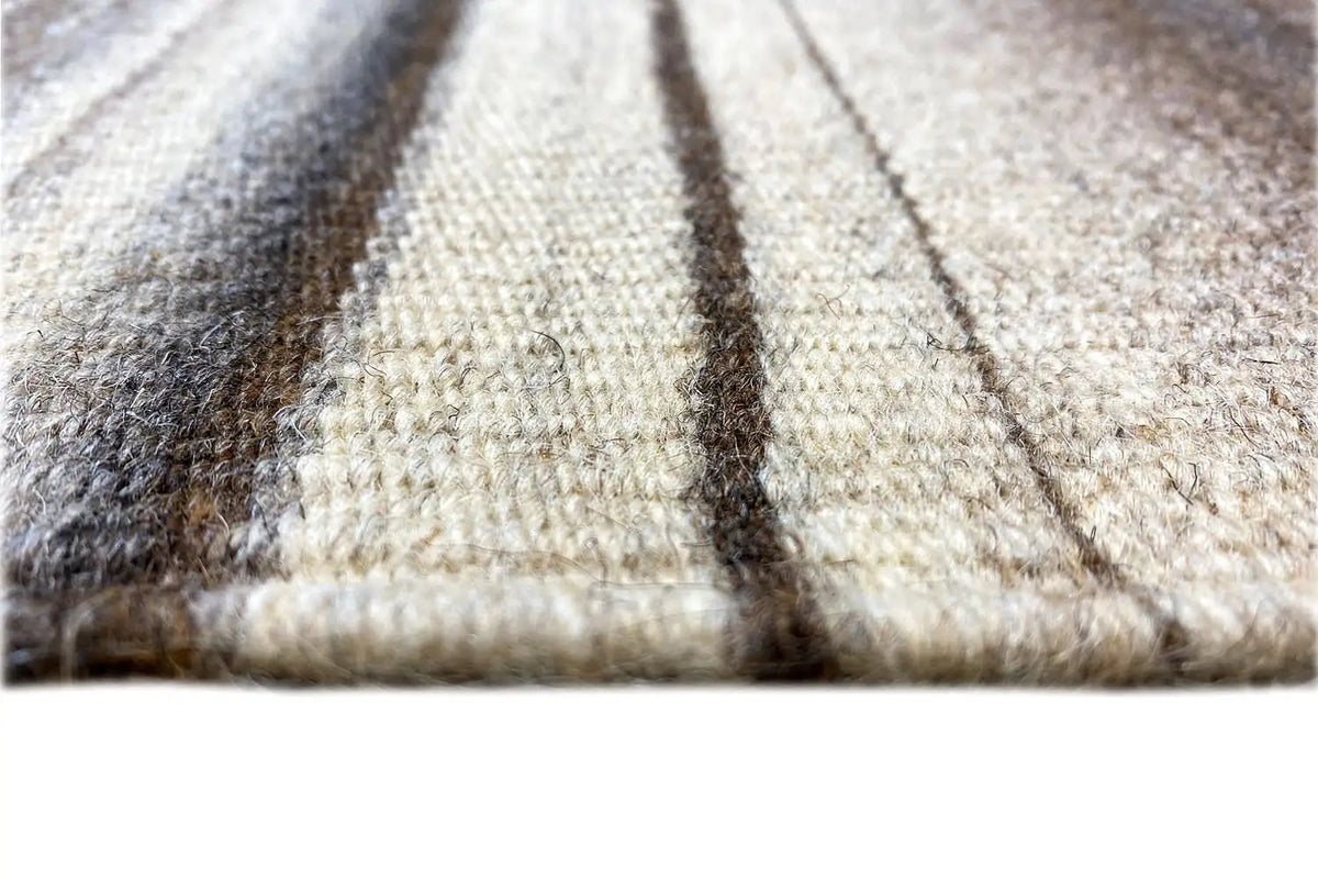 Corner kilim-dhurrie rug: tightly woven fibers, coordinated stripes, short pile