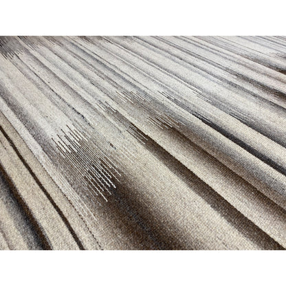 Close-up of a kilim dhurrie rug: light and dark stripes with patterned details
