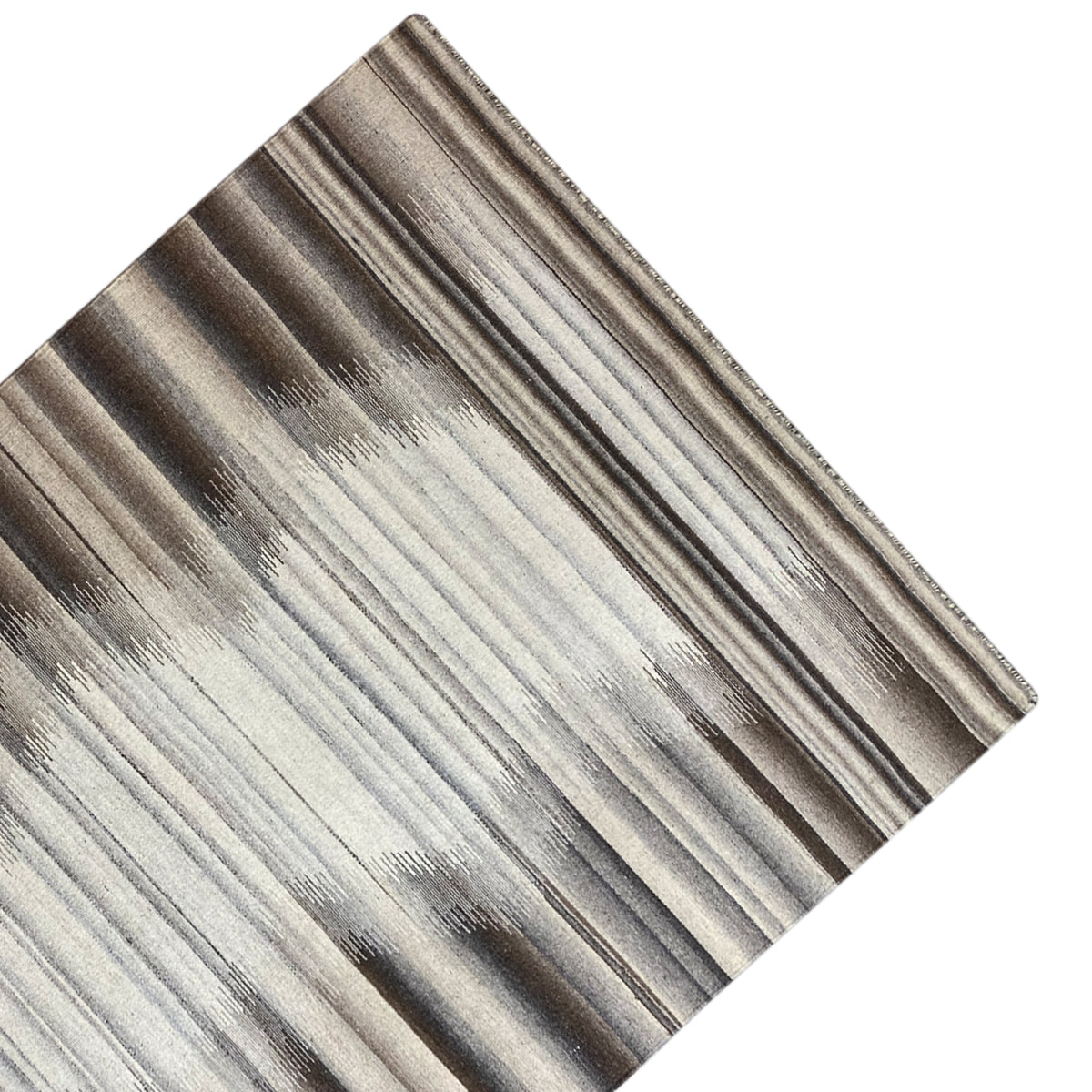 Close-up of a Kilim-Dhurrie rug: even stripes in beige, gray, and brown