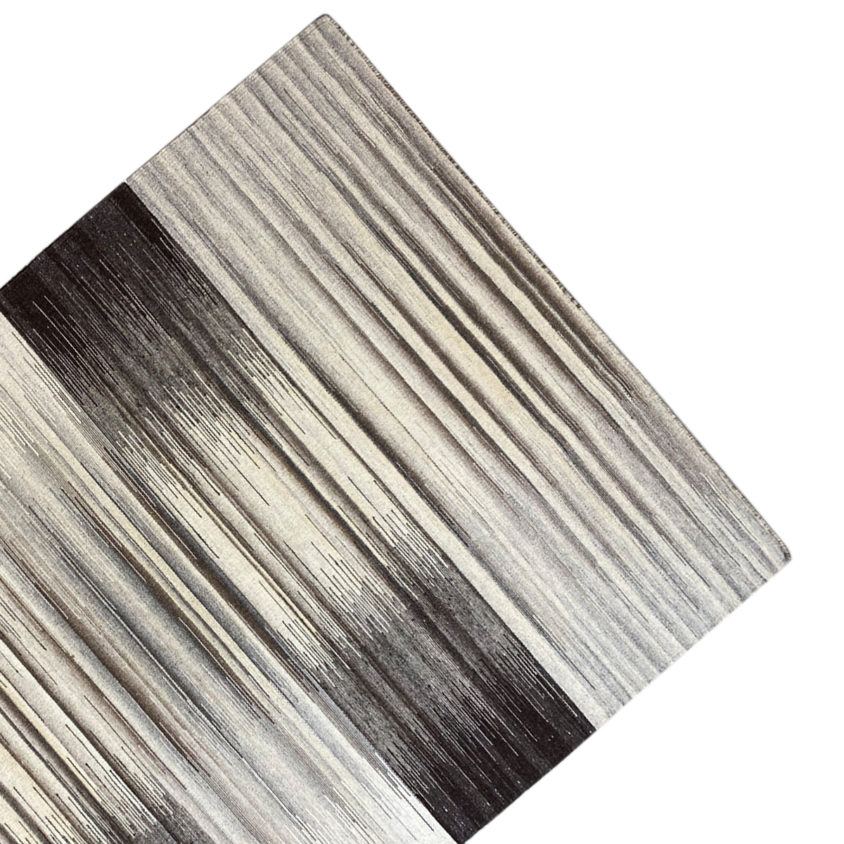 Kilim rug close-up of the stripes in gray and dark brown