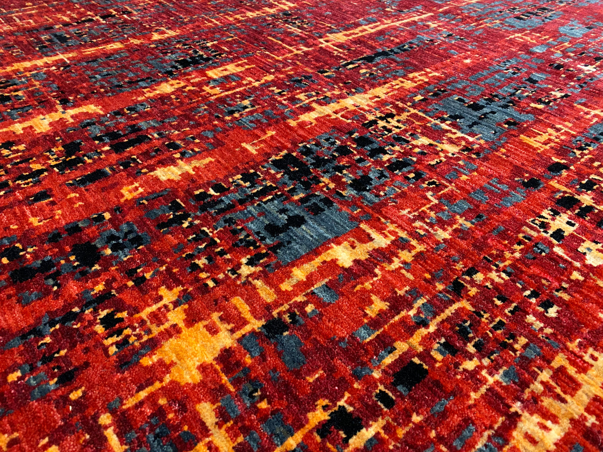 Bunter moderner Teppich mit geometrischem Patchwork-Muster in Rot, Blau und Gelb