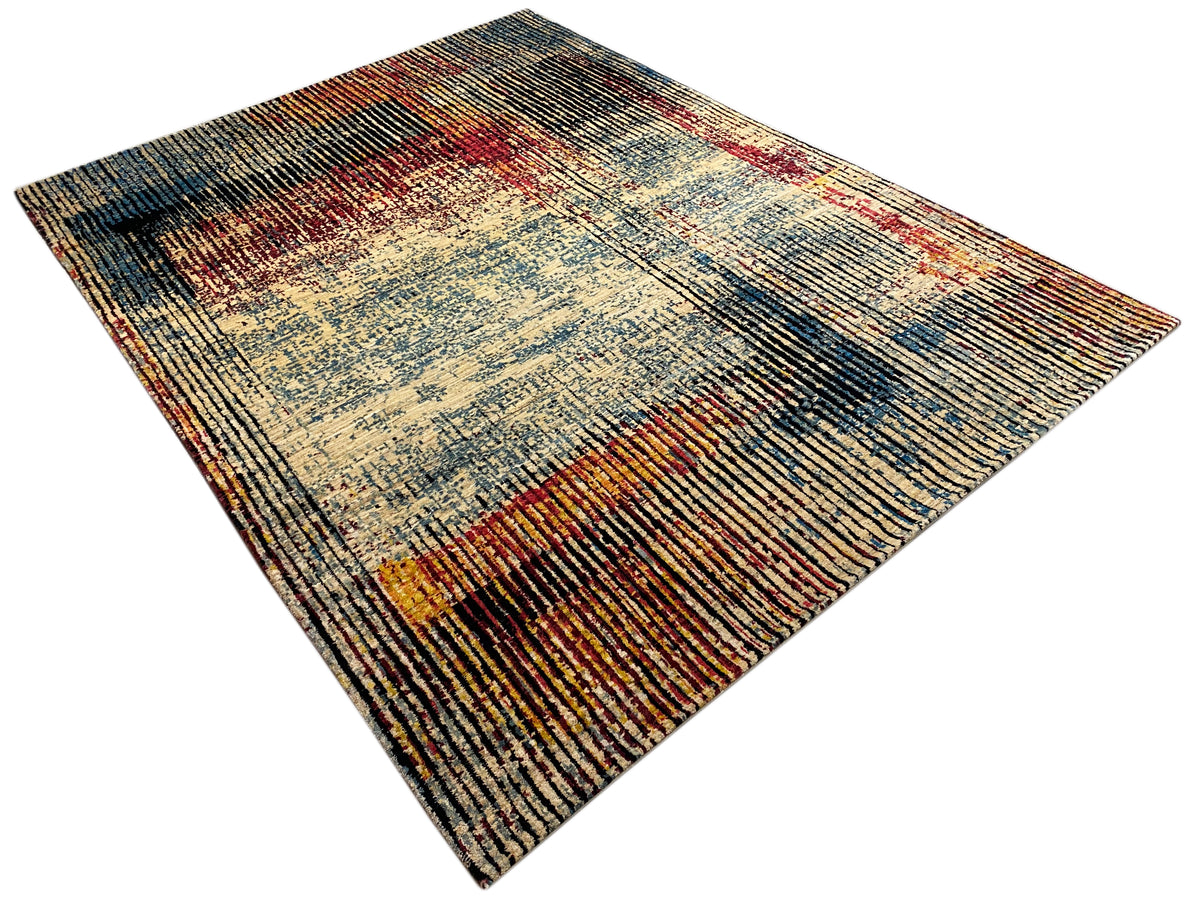 Moderner Teppich, diagonale Ansicht: Patchwork-Muster in Blau, Beige, Rot und Schwarz