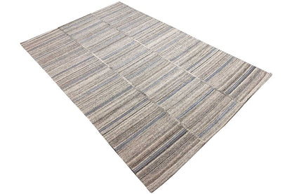 Kilim rug, diagonal view, geometric checked pattern in gray, beige, and blue