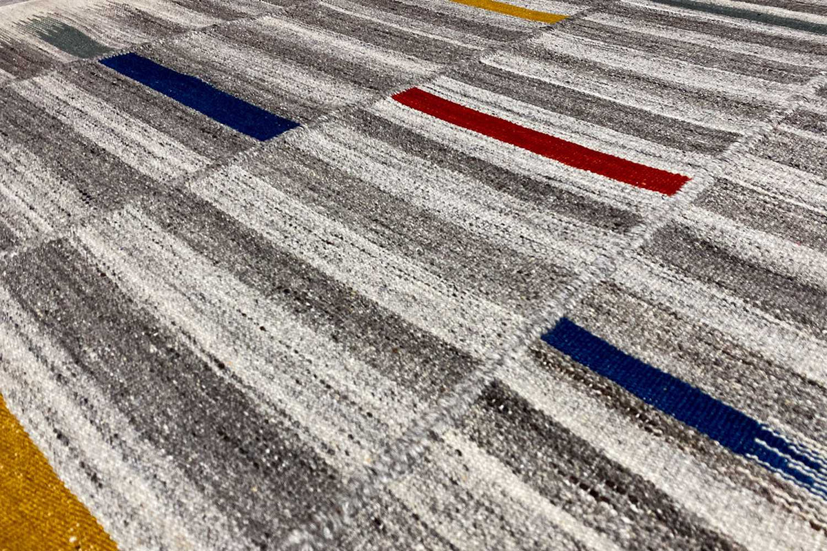 Modern kilim dhurrie 241x154 cm: close-up with gray stripes and color blocks