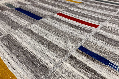 Modern kilim dhurrie 241x154 cm: close-up with gray stripes and color blocks