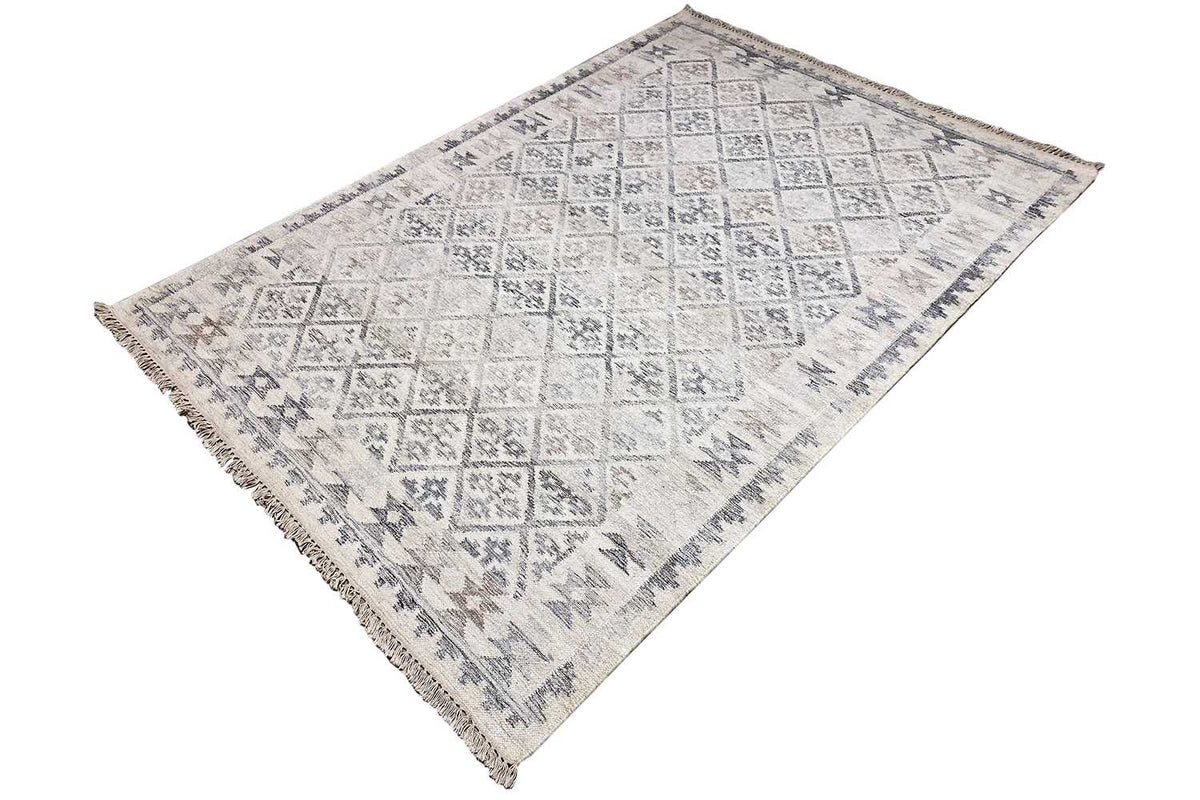 Kilim rug from a perspective view: light beige with blue-gray diamond and line patterns