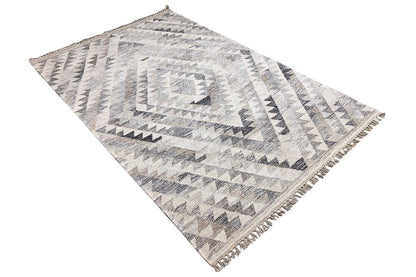 Kelim dhurrie rug diagonal view, geometric patterns, fringes along the edge