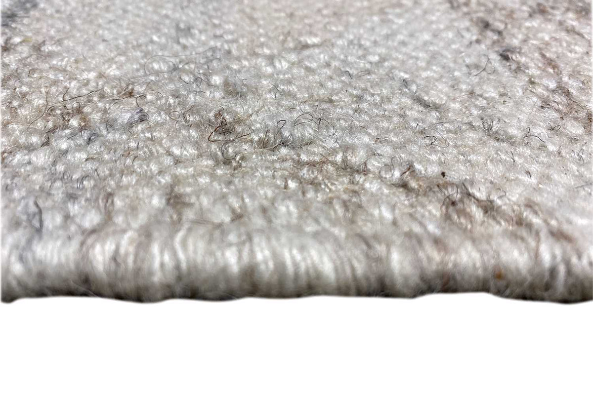 Kelim dhurrie rug detail of the pile texture, light gray with darker threads, short