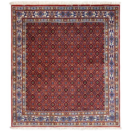 Oriental rug 132x122 cm with a red medallion pattern and multicolored border