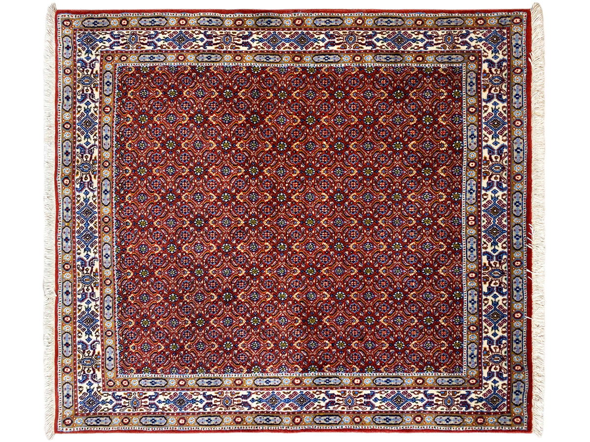 Oriental rug 132x122 cm, red coffered pattern with blue border